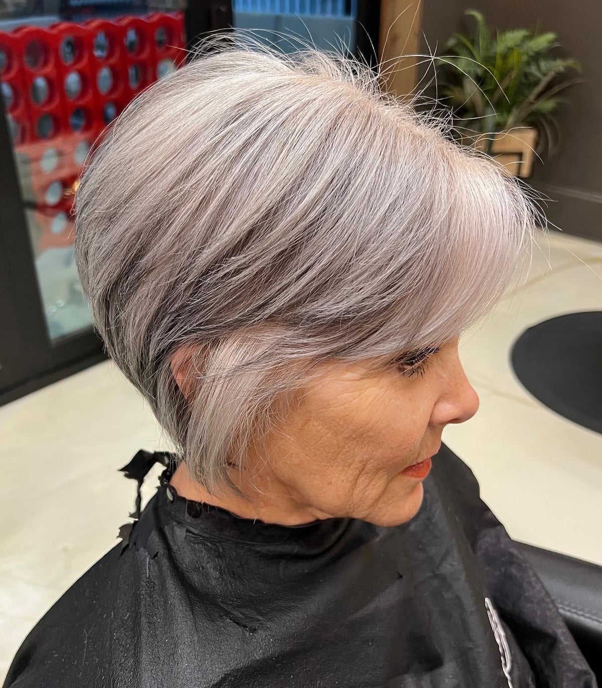 Ash Gray Pixie With Darker Lowlights Ash Gray Pixie With Darker Lowlights — Trendy Gray Hair Color