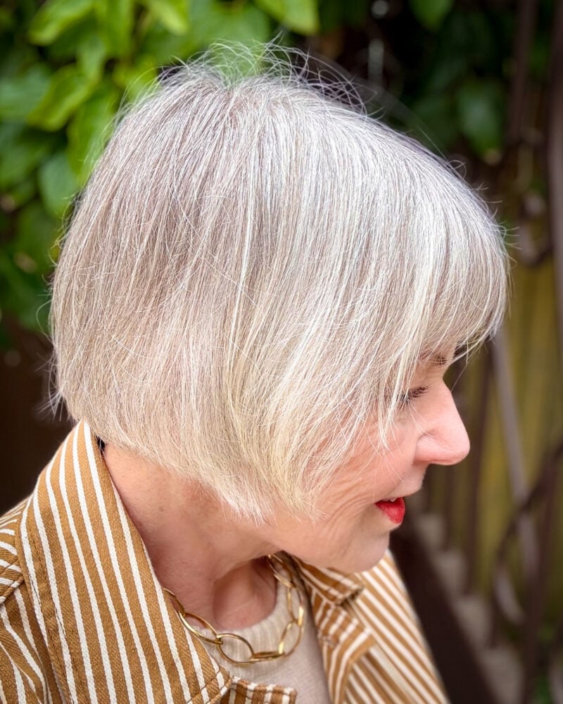 Ash Gray Layered Bob With Highlights Ash Gray Layered Bob With Highlights — Trendy Gray Hair Color