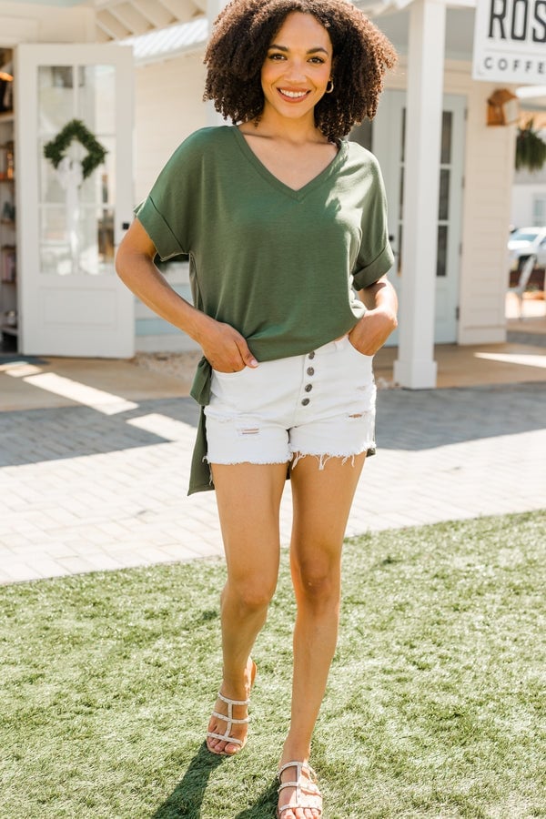 Olive Green V-Neck Top with Distressed Denim Shorts, Close-Up Take Olive Green V-Neck Top with Distressed Denim Shorts, Close-Up Take — Trendy Green Top Outfits