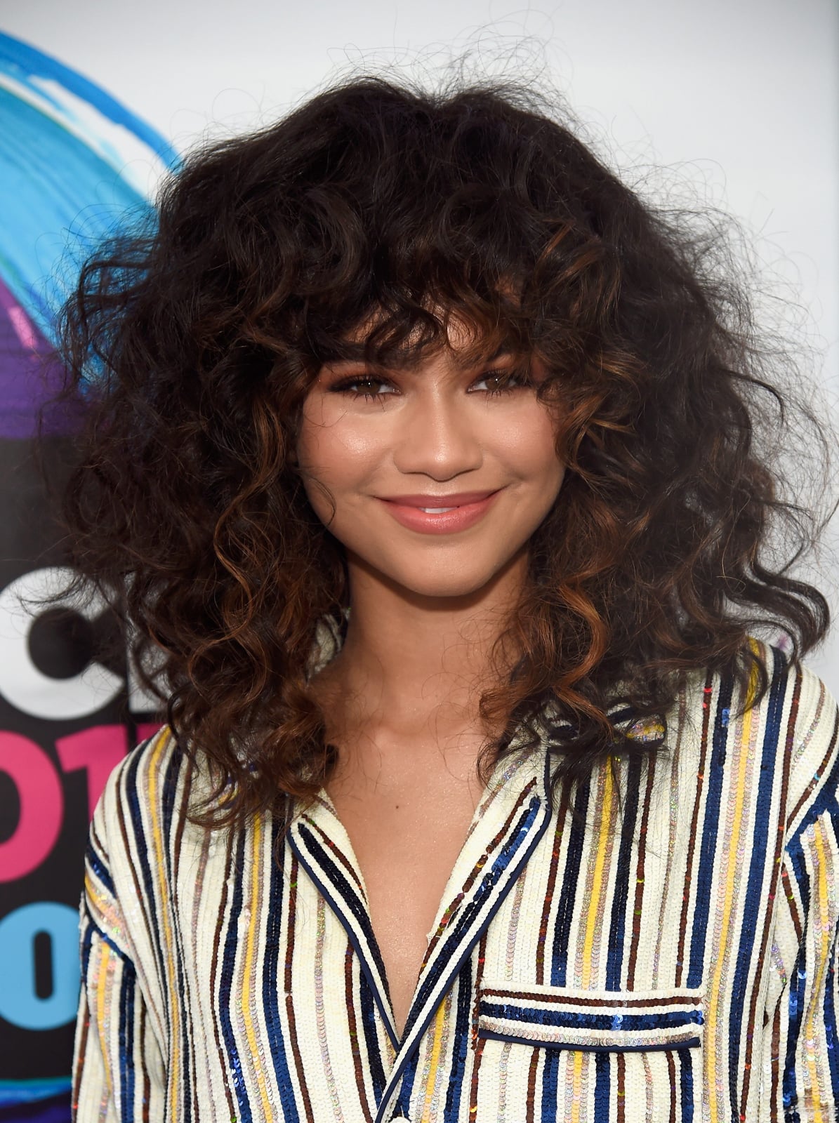 Shoulder Length Curly Shag With Auburn Highlights — Trendy Hairstyles for Teens