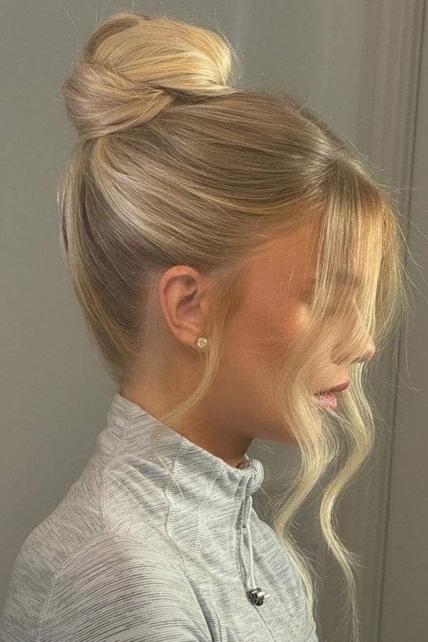 Sleek High Bun Ash Blonde Side Bangs Sleek High Bun Ash Blonde Side Bangs — Trendy High Bun Hairstyles