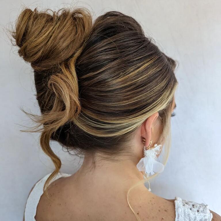Textured Updo Dark Brown Blonde Highlights Textured Updo Dark Brown Blonde Highlights — Trendy High Bun Hairstyles