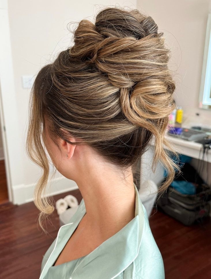 Textured High Bun Blonde Balayage Twisted Sections Textured High Bun Blonde Balayage Twisted Sections — Trendy High Bun Hairstyles