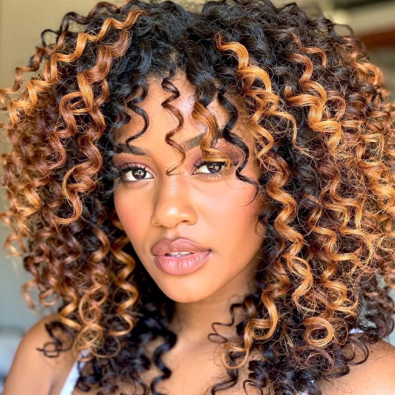 Shoulder-Length Curly With Caramel and Blonde Highlights — Trendy Highlights Hair