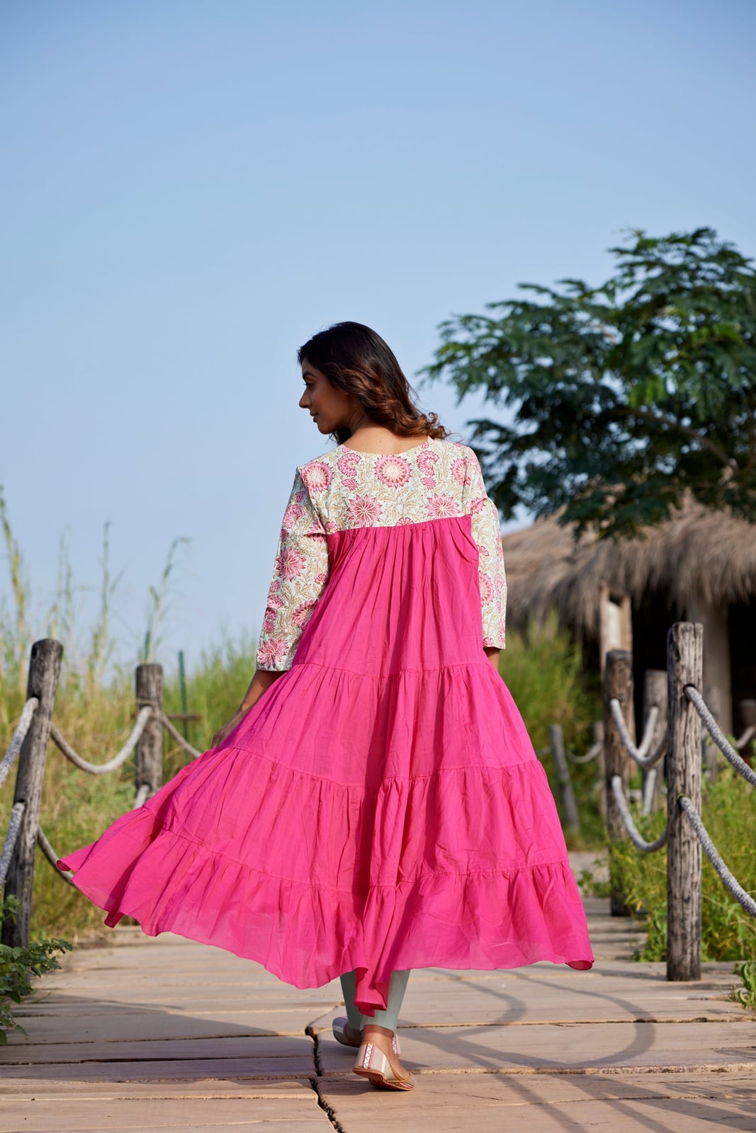 Hot Pink Tiered Cotton Dress with Floral Print Yoke, Close-Up Take Hot Pink Tiered Cotton Dress with Floral Print Yoke, Close-Up Take — Trendy Hot Pink Dress