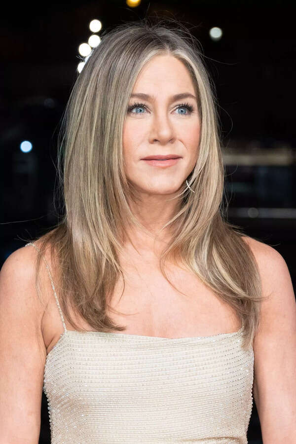 Shoulder Length Layered Shag With Bangs Shoulder Length Layered Shag With Bangs — Trendy Jennifer Aniston Hair