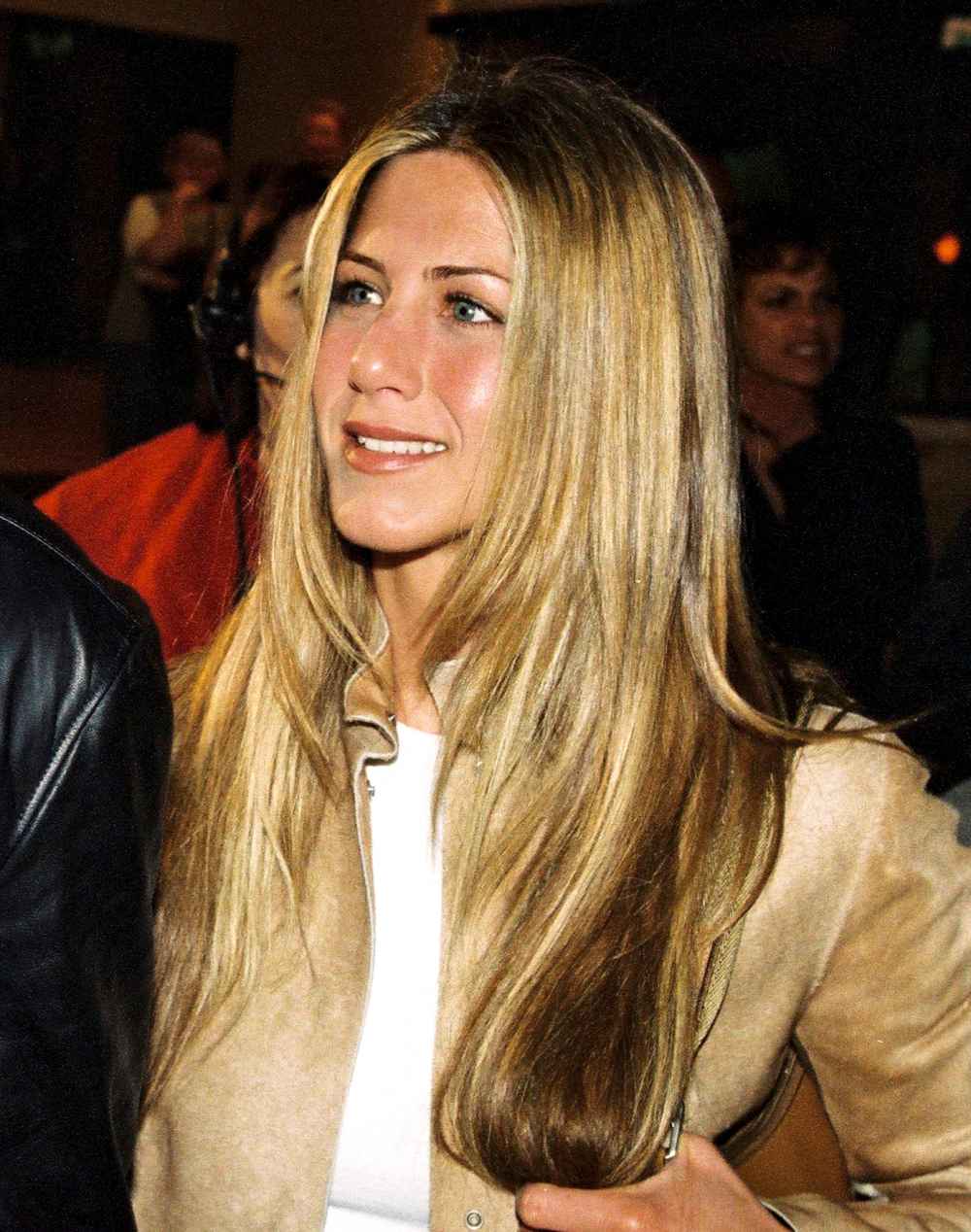 Mid-Back Layers With Tousled Waves Mid-Back Layers With Tousled Waves — Trendy Jennifer Aniston Hair