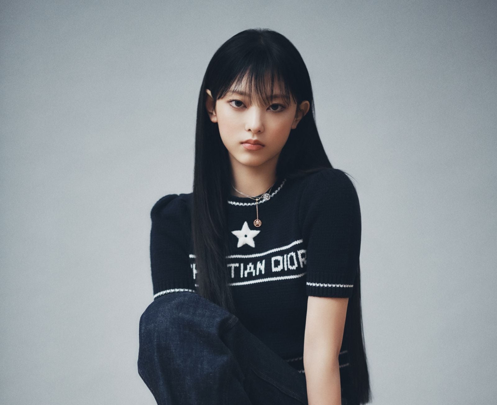 Fitted Knit Top with Star Detail and Denim Jeans Fitted Knit Top with Star Detail and Denim Jeans — Trendy K-pop Outfits