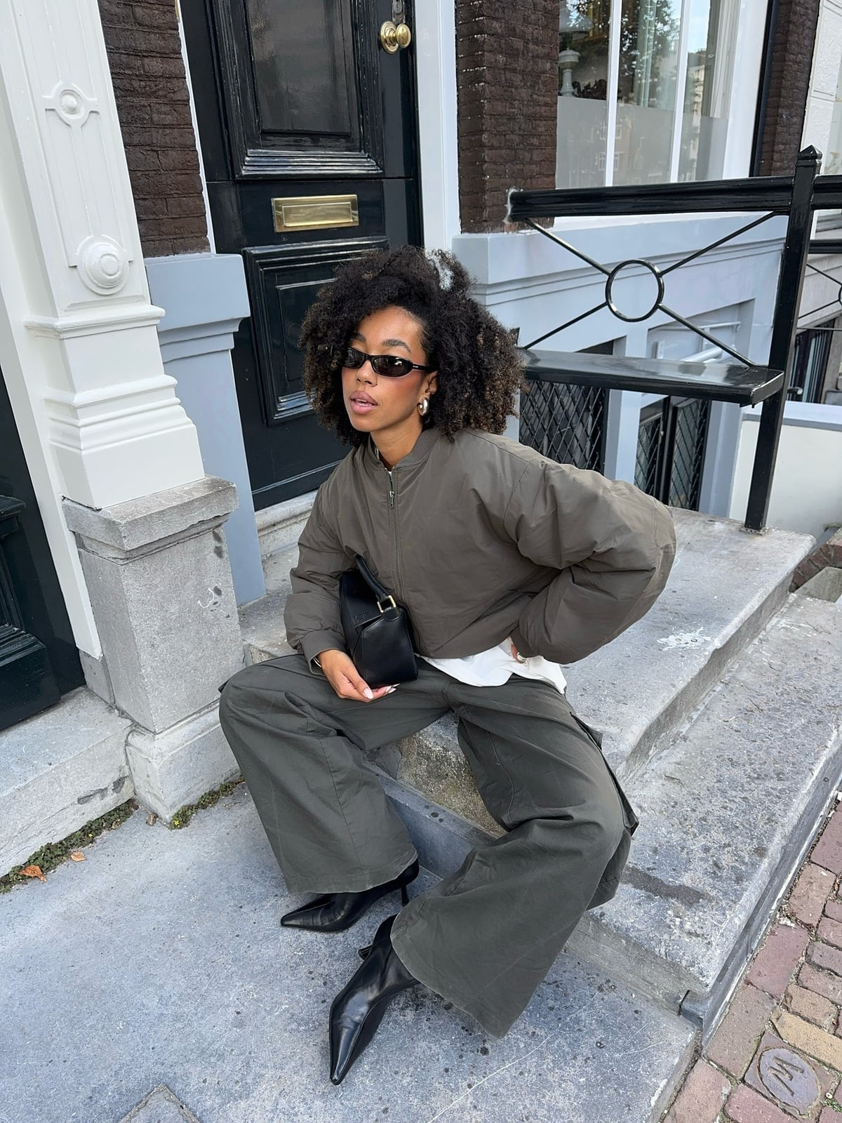 Cargo Pants and Bomber Jacket with Kitten Heel Boots, Close-Up Take Cargo Pants and Bomber Jacket with Kitten Heel Boots, Close-Up Take — Trendy Kitten Heels Outfits