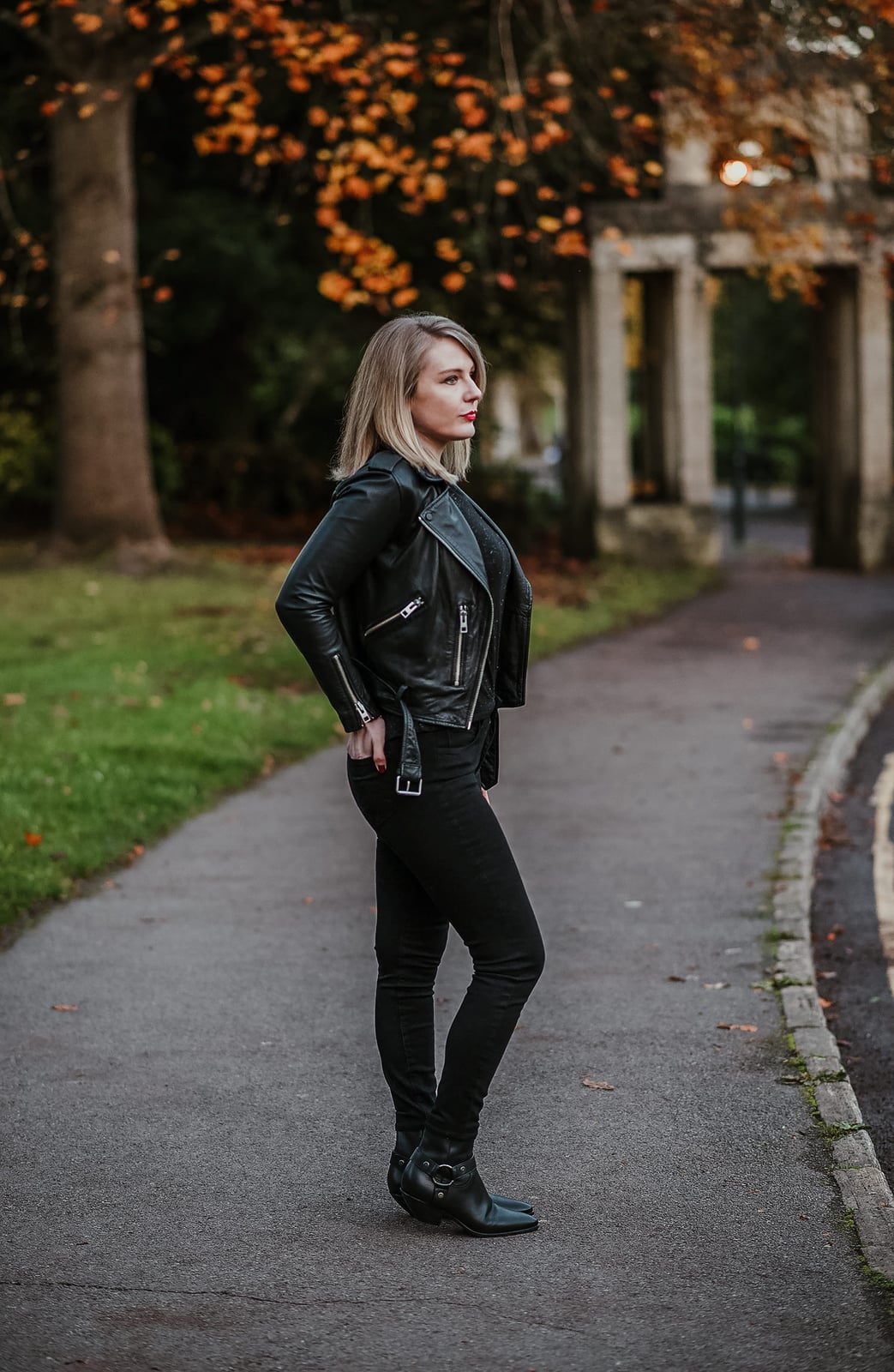 Black Leather Motorcycle Jacket with Black Top, Close-Up Take Black Leather Motorcycle Jacket with Black Top, Close-Up Take — Trendy Leather Jacket Outfits Women