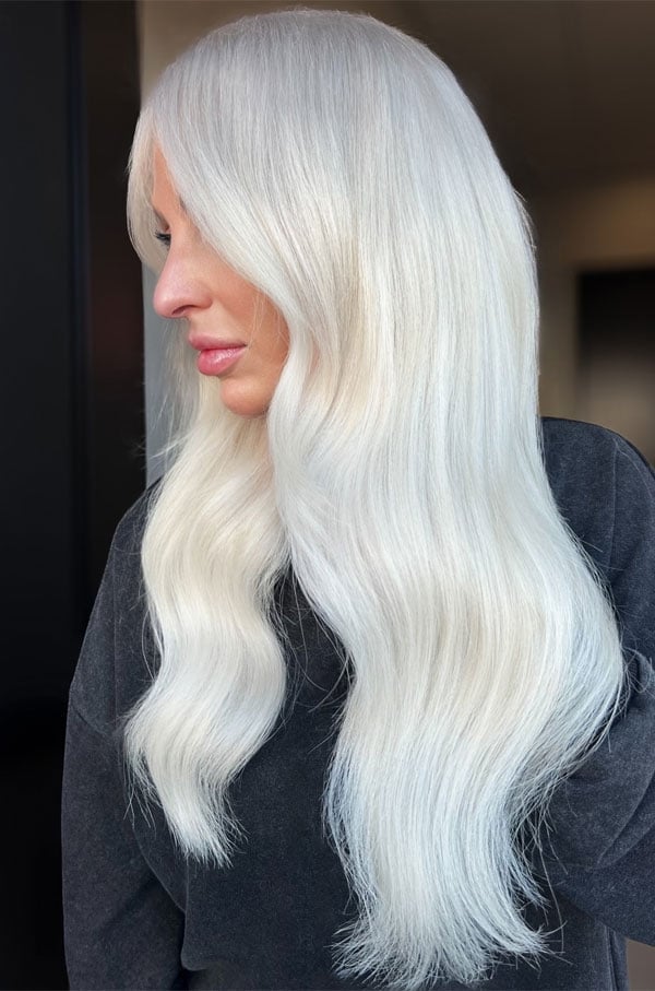 Long Platinum Blonde With Wispy Bangs — Trendy Light Hair Color