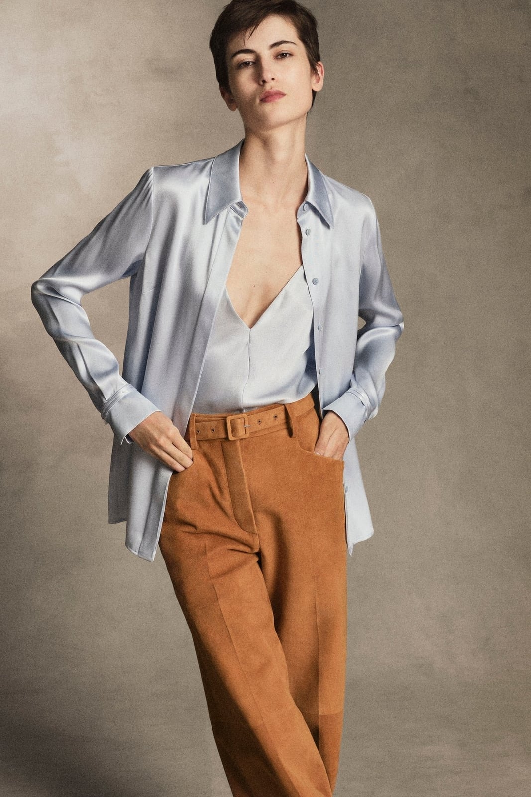 Light Blue Satin Oversized Shirt With Tan Suede Trousers Light Blue Satin Oversized Shirt With Tan Suede Trousers — Trendy Luxury Outfits