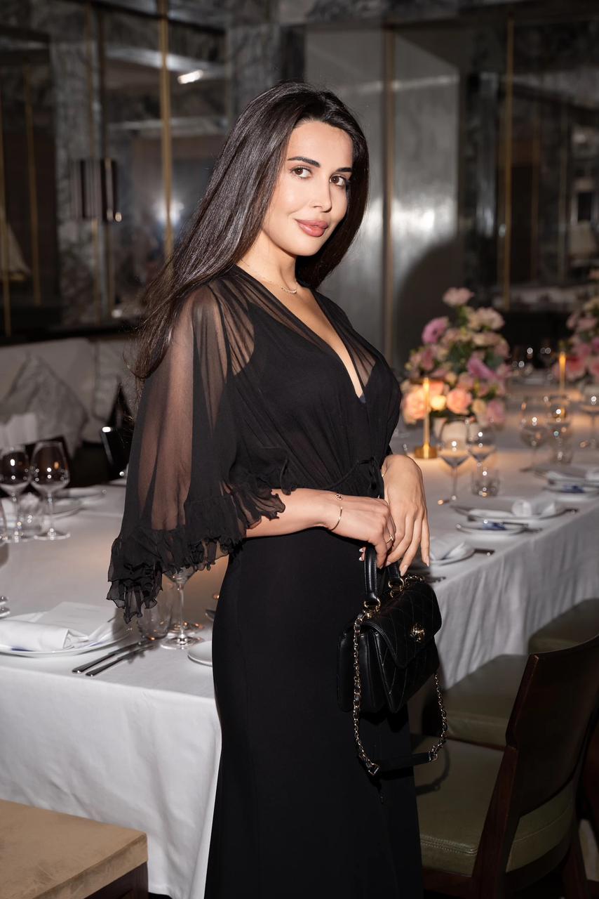 Elegant Black Dress With Deep V-Neck And Sheer Flutter Sleeves Elegant Black Dress With Deep V-Neck And Sheer Flutter Sleeves — Trendy Luxury Outfits