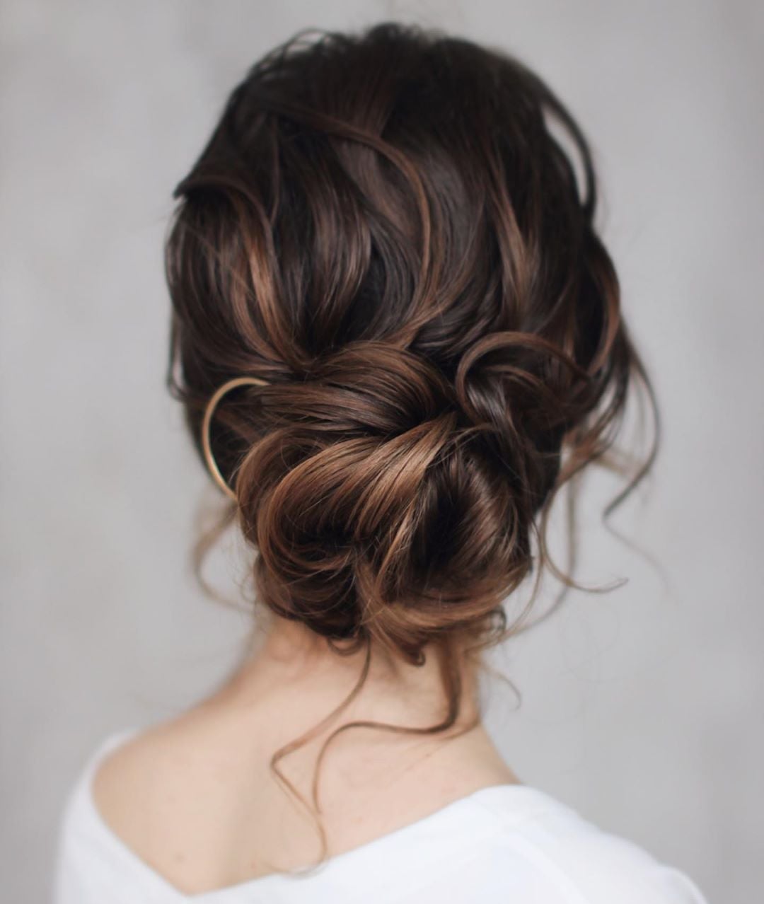 Sleek Ash Blonde Low Bun — Trendy Messy Bun Updo