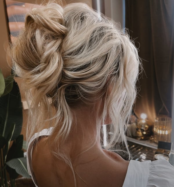 Ash Blonde Messy Bun With Loose Strands — Trendy Messy Bun Updo
