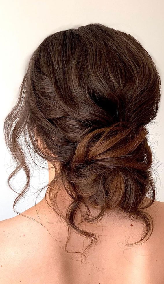 Dark Brown Messy Bun With Loose Tendrils — Trendy Messy Bun Updo