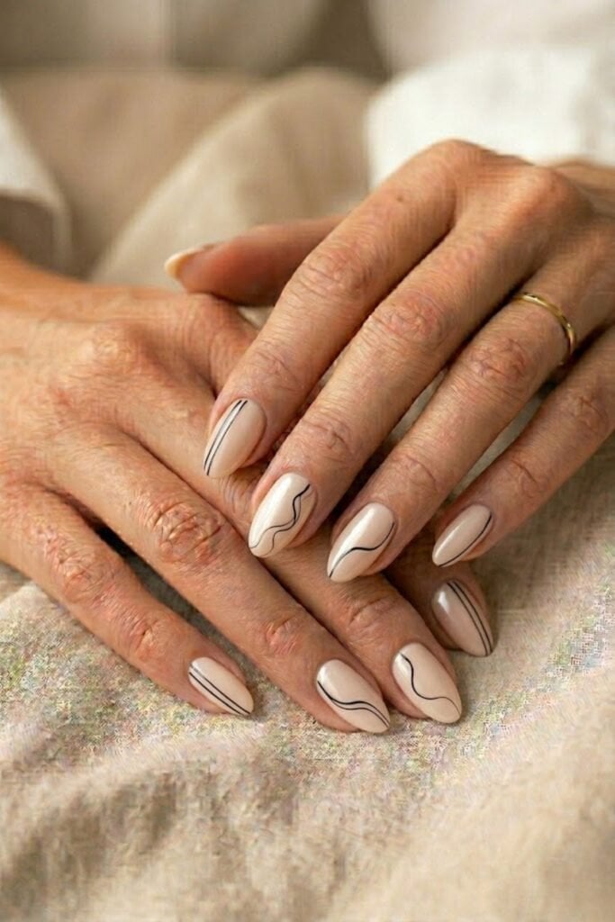 Short Almond Pale Nude With Black Lines Short Almond Pale Nude With Black Lines — Trendy Minimal Nails