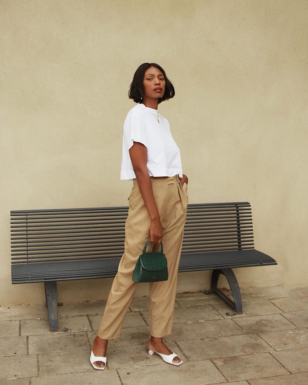Cropped White T-Shirt with Beige Straight Leg Trousers and Green Cropped White T-Shirt with Beige Straight Leg Trousers and Green — Trendy Minimalist Outfits