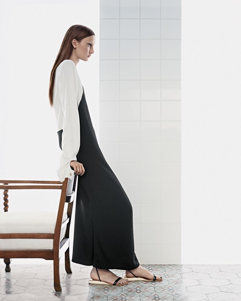 Black Wide Leg Jumpsuit Over White Long Sleeve Blouse Black Wide Leg Jumpsuit Over White Long Sleeve Blouse — Trendy Minimalist Outfits