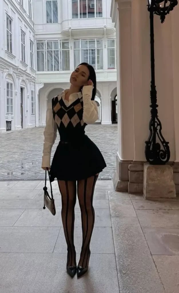 Argyle Sweater Vest with Black Mini Skirt and Striped Stockings Argyle Sweater Vest with Black Mini Skirt and Striped Stockings — Trendy Office Siren Outfits