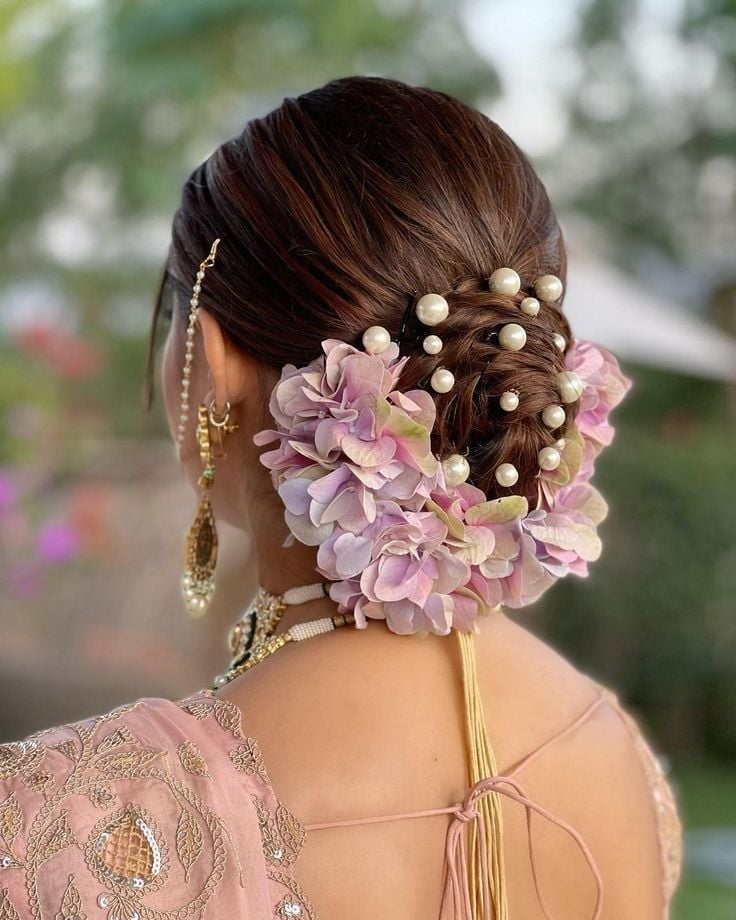 Braided Bun With Floral Embellishments, Long Braided Bun With Floral Embellishments, Long — Trendy Party Hair
