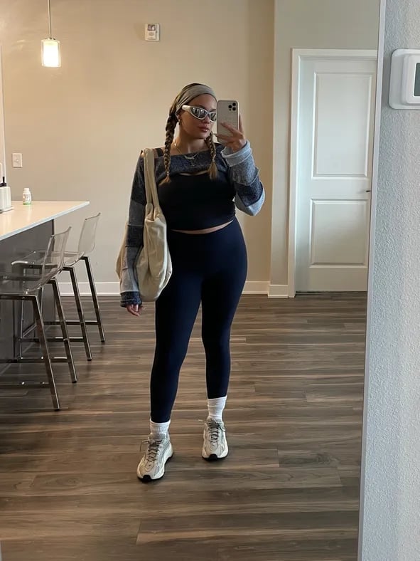 Striped Sweatshirt Layered Over Crop Top and Leggings — Trendy Pilates Outfits