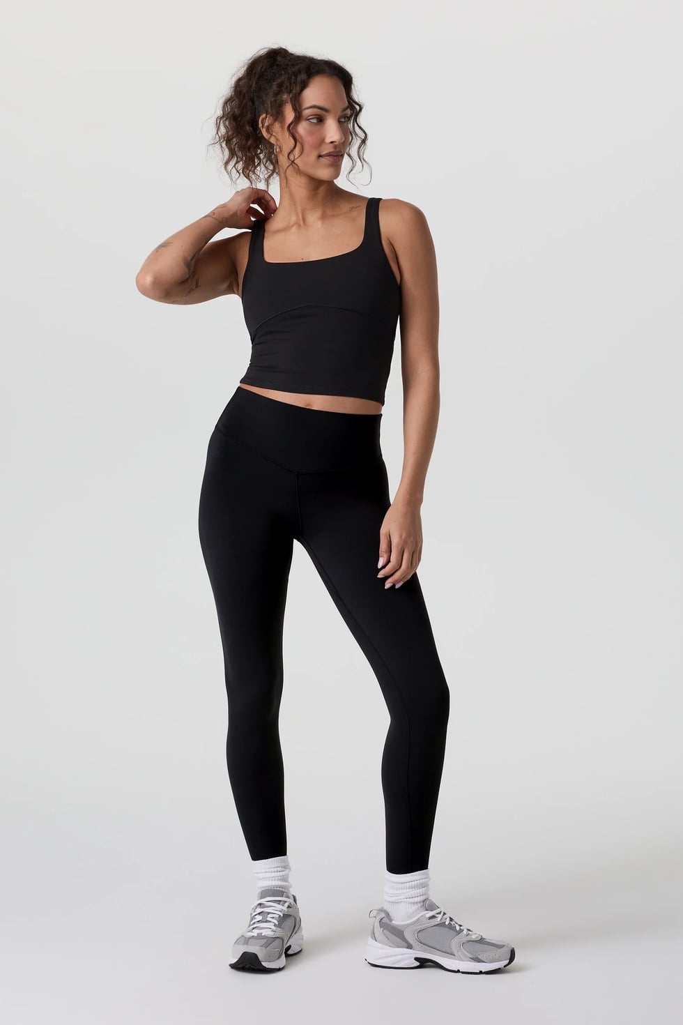 Black Ribbed Crop Top and Leggings Seamless Set, Close-Up Take — Trendy Pilates Outfits