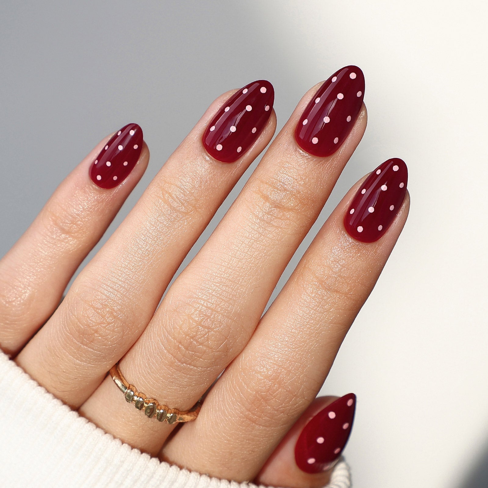 Short Almond Dark Red with White Polka Dots — Trendy Red Almond Nails