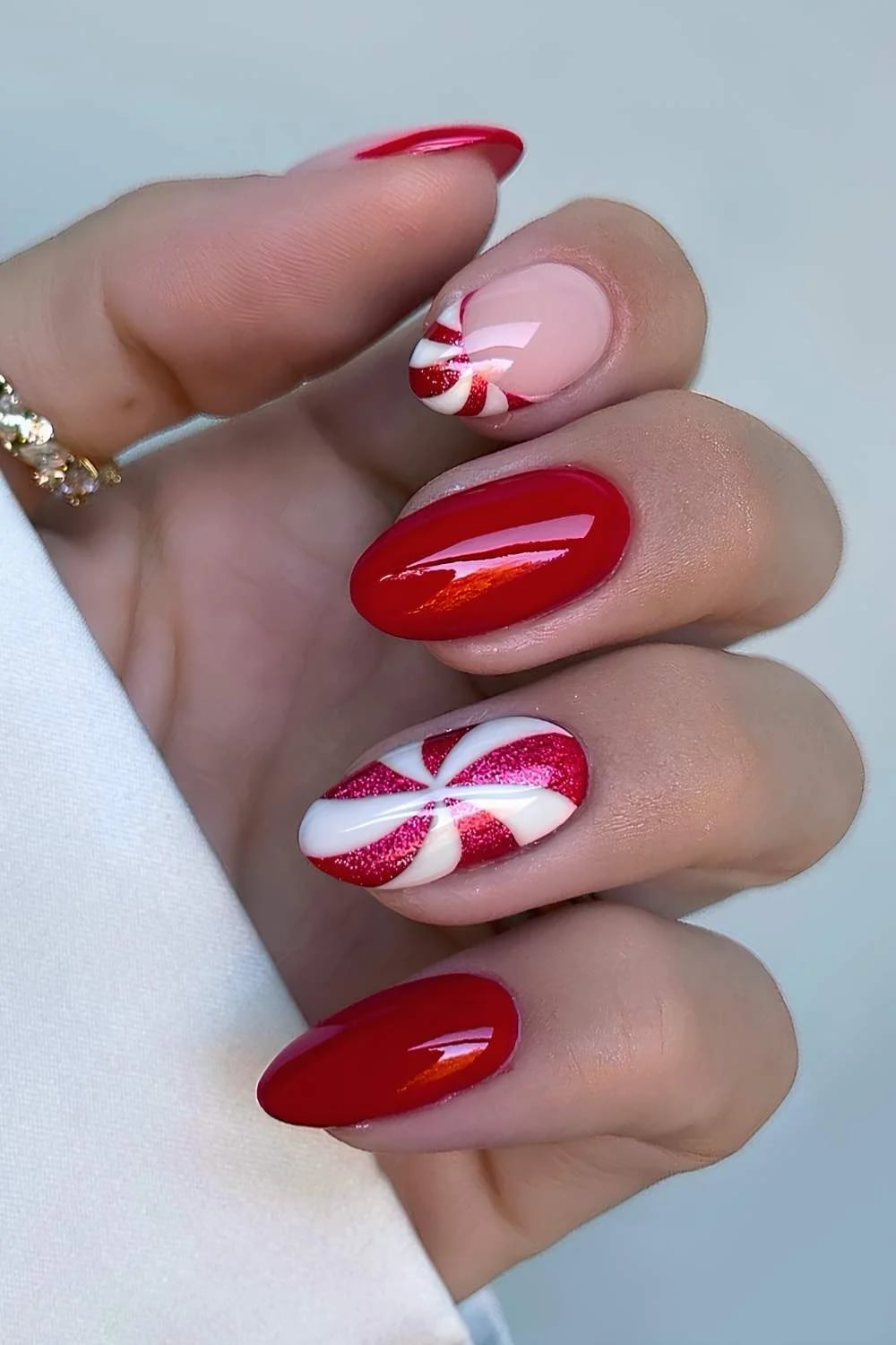Long Almond Sheer Pink with Red Tips and 3D Bows, Close-Up Take — Trendy Red Almond Nails