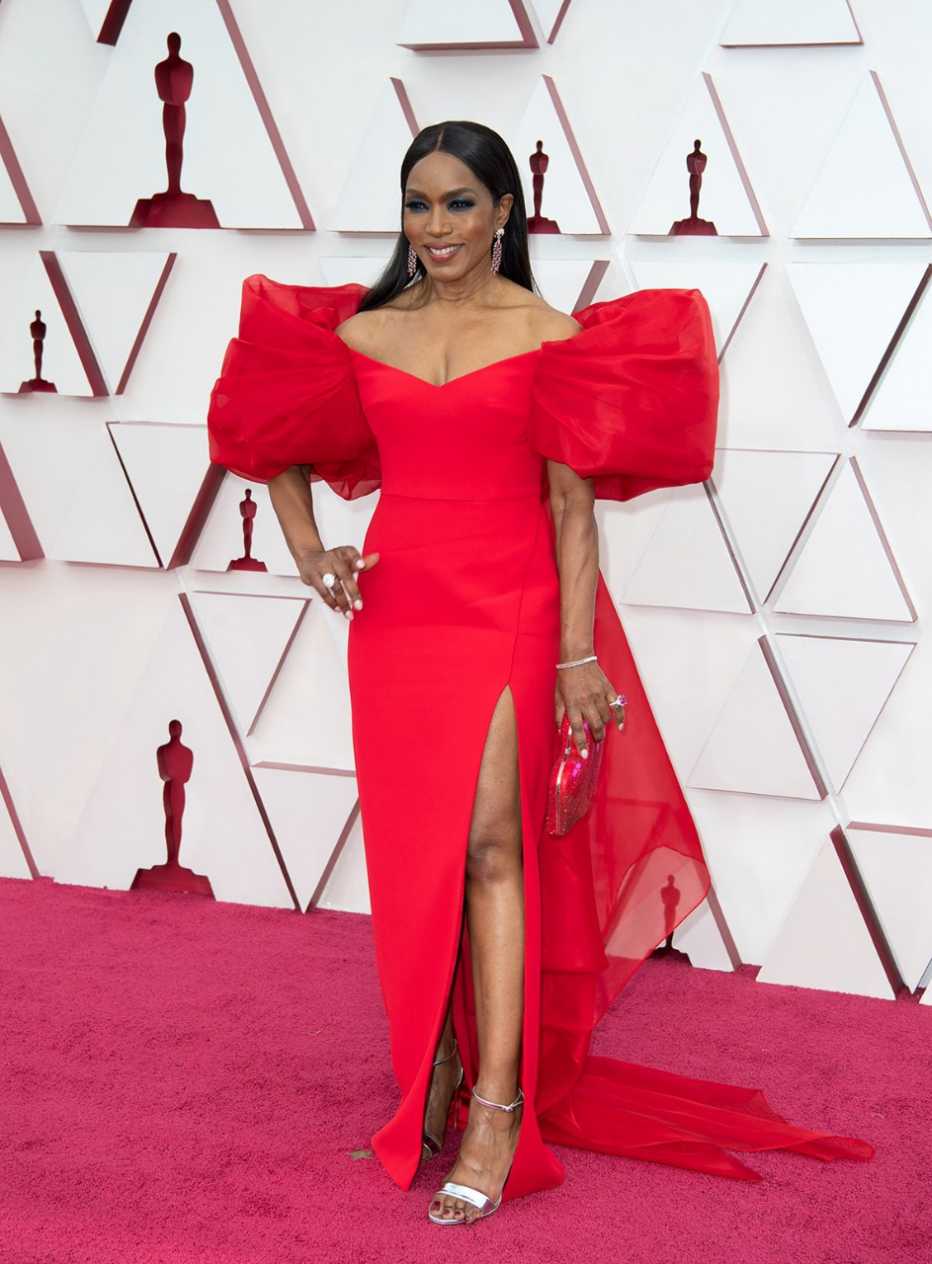 Red Gown With Voluminous Statement Sleeves And Train — Trendy Red Carpet Outfits