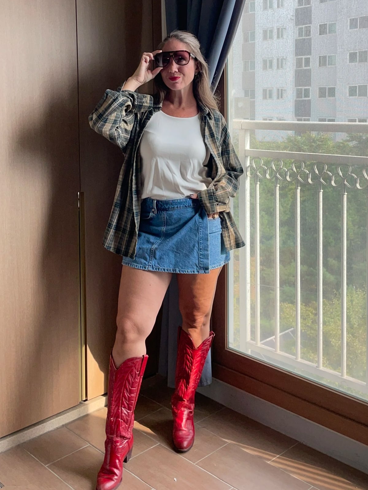 Red Cowboy Boots with Plaid Shirt and Denim Skirt Red Cowboy Boots with Plaid Shirt and Denim Skirt — Trendy Red Cowboy Boots Outfit