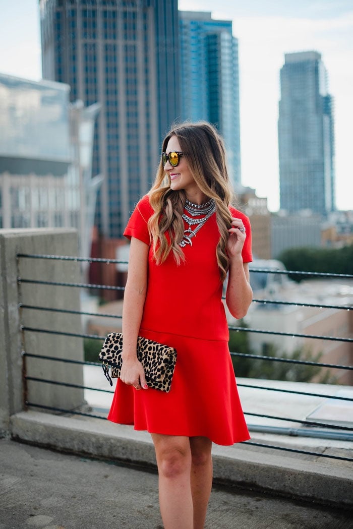 Red Fit and Flare Dress with Statement Necklace Red Fit and Flare Dress with Statement Necklace — Trendy Red Dresses Outfits