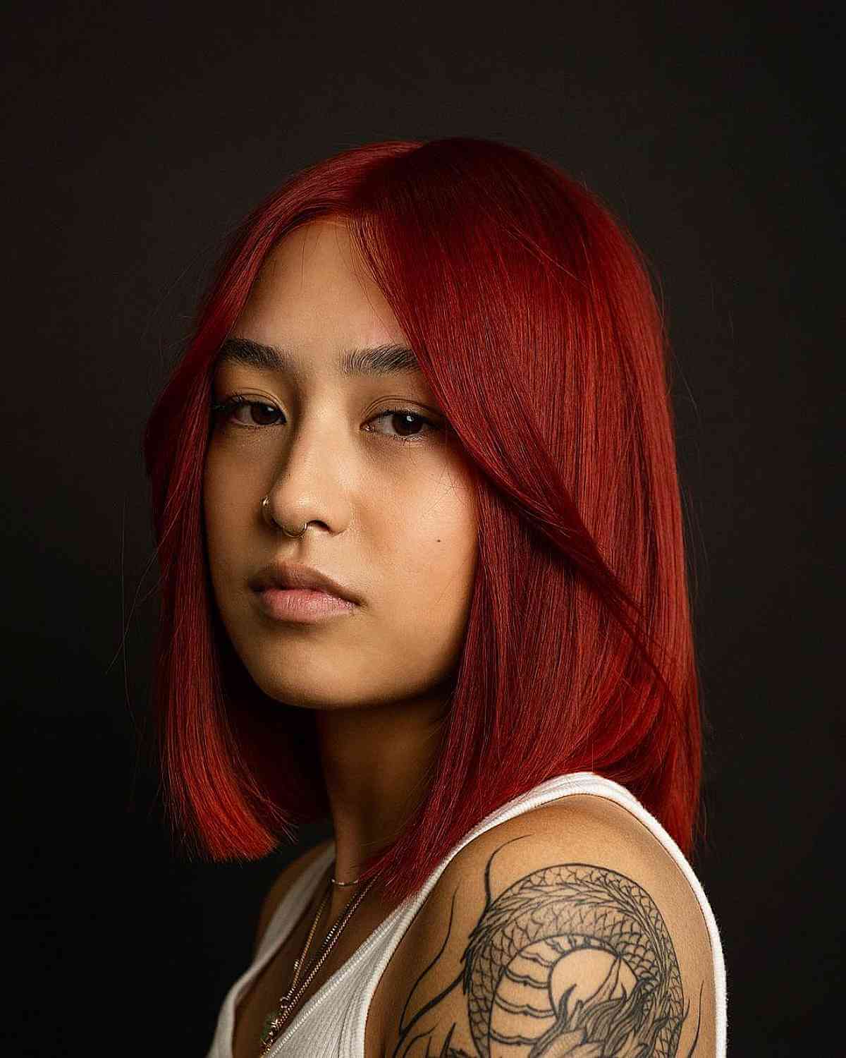 Chin Length Bright Red Lob With Side Swept Bangs Chin Length Bright Red Lob With Side Swept Bangs — Trendy Red Hairstyles