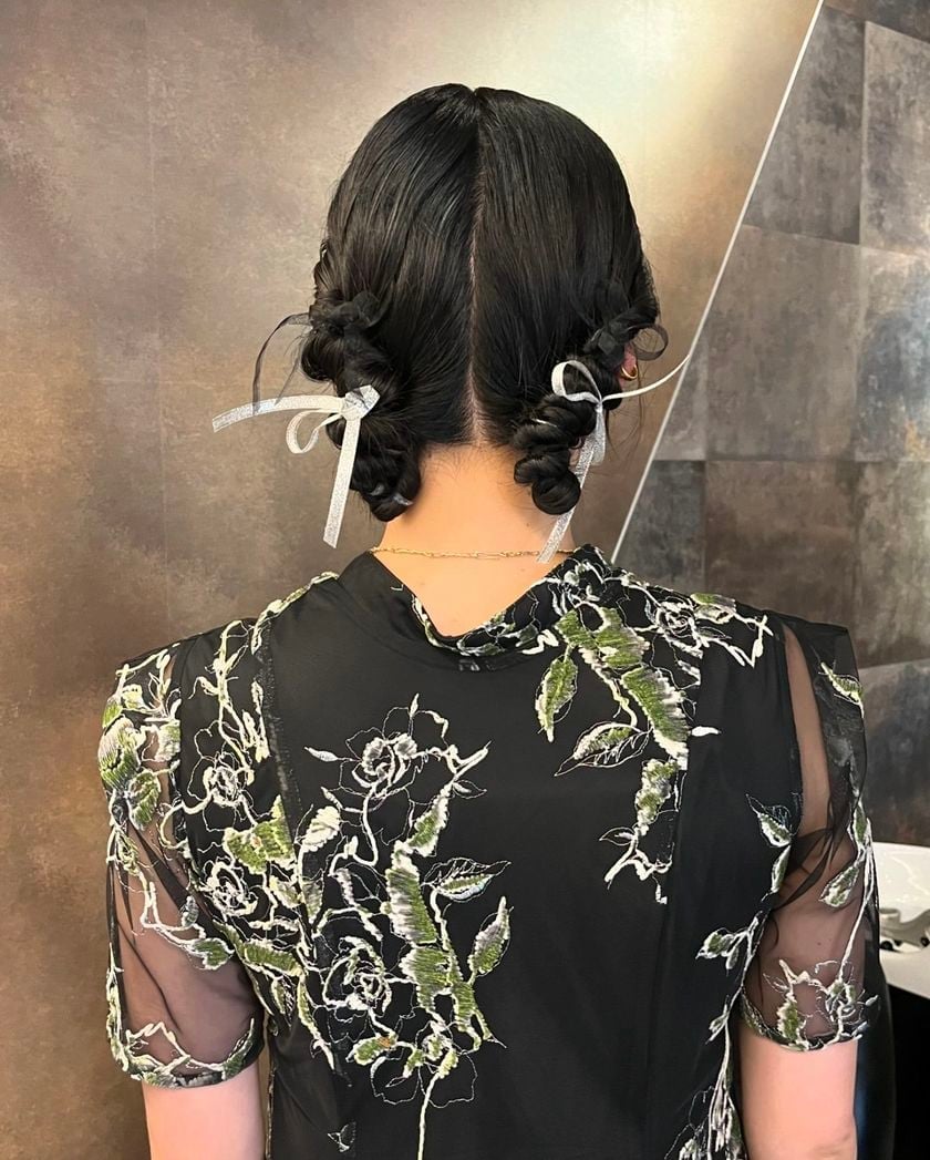 Fine Dark Brown Braided Buns With White Ribbons Fine Dark Brown Braided Buns With White Ribbons — Trendy Ribbon Braids