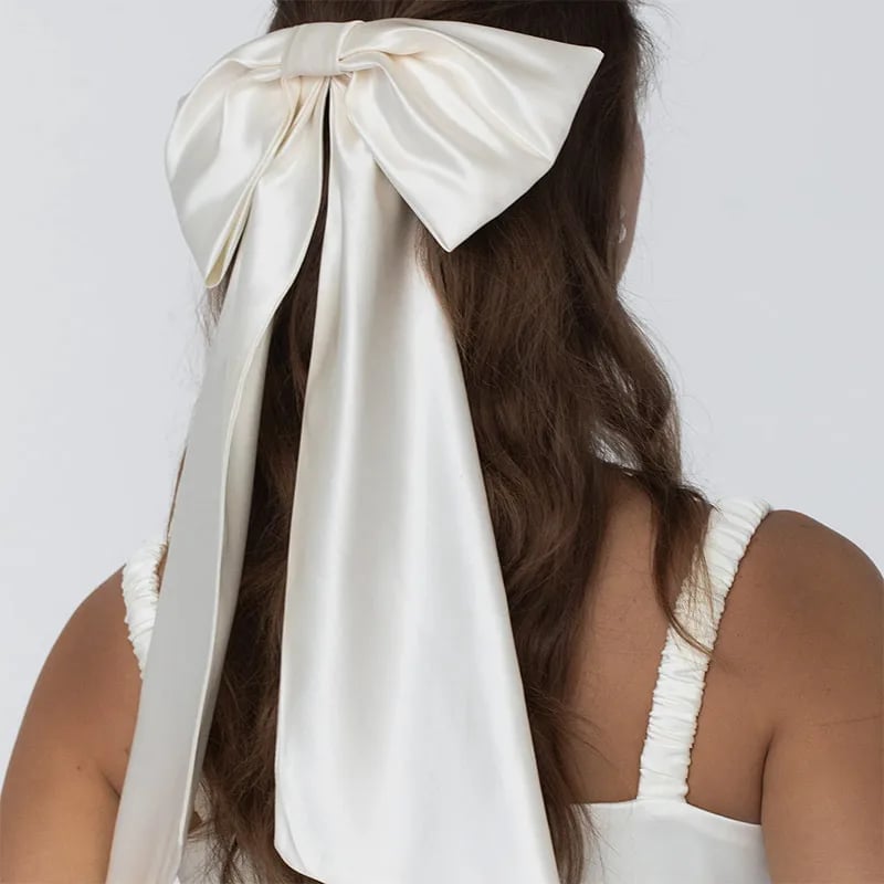 Mid-Back Waves With Oversized Ivory Bow — Trendy Ribbon Hair