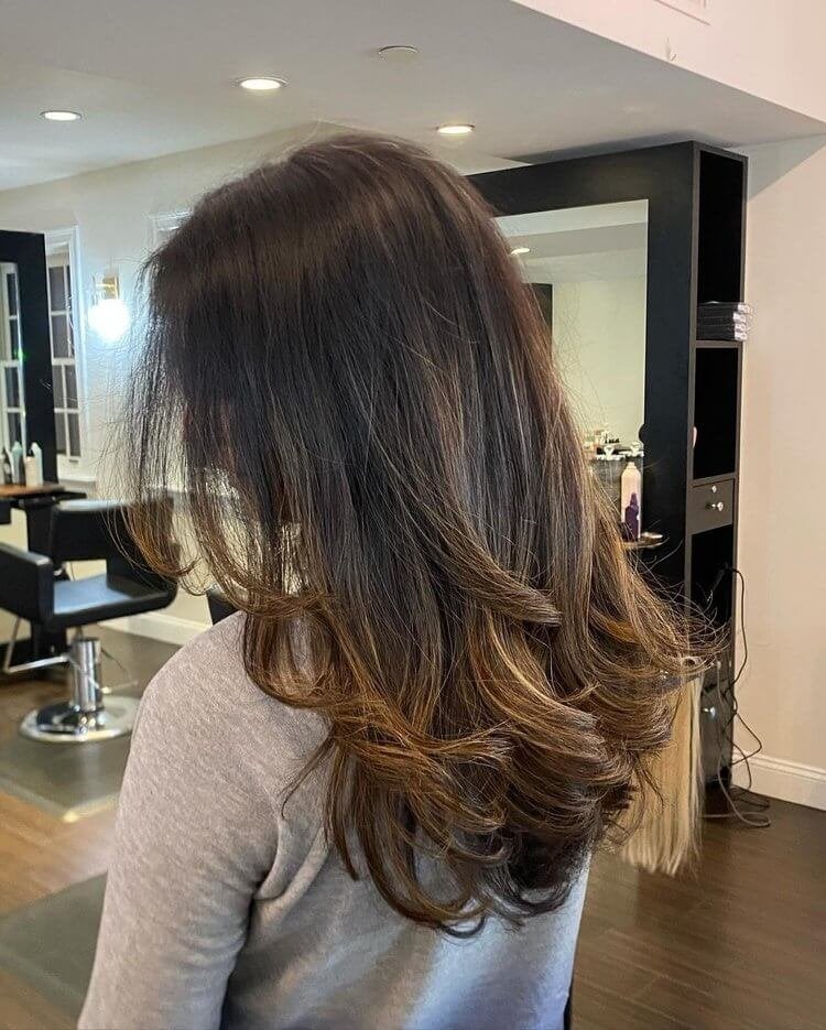 Mid-Back Dimensional Brunette With Face-Framing Bangs — Trendy Rich Brunette
