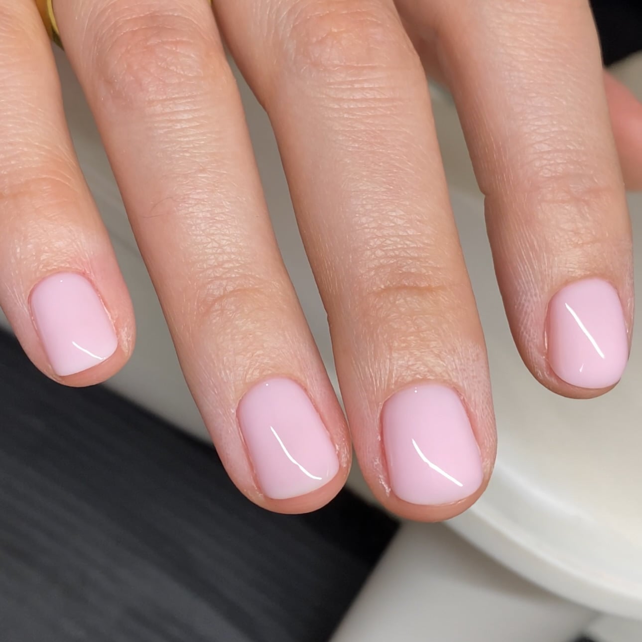 Milky Light Pink Glossy Short Round Nails, Close-Up Take — Trendy Round Nails
