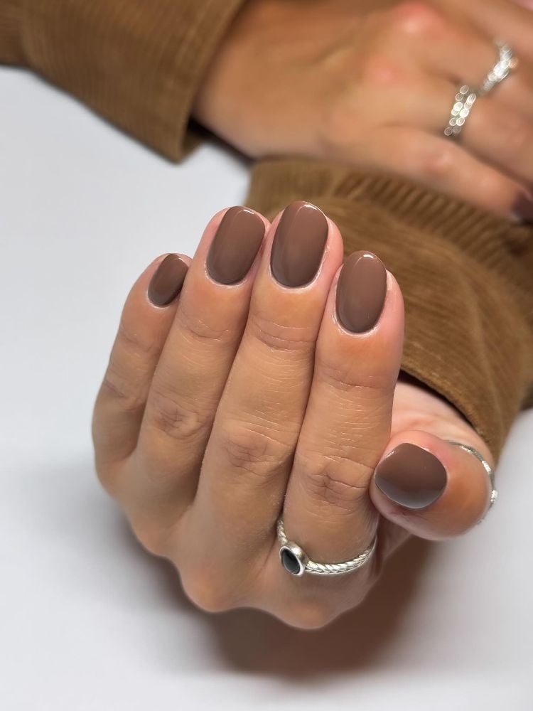 Short Almond Milky Pink Aura Effect Nails With White French Tips — Trendy Round Nails