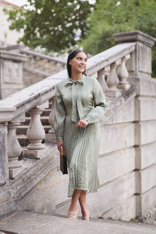 Sage Green Satin Long Sleeve Midi Dress with Bow Neck, Close-Up Take Sage Green Satin Long Sleeve Midi Dress with Bow Neck, Close-Up Take — Trendy Sage Green Dress