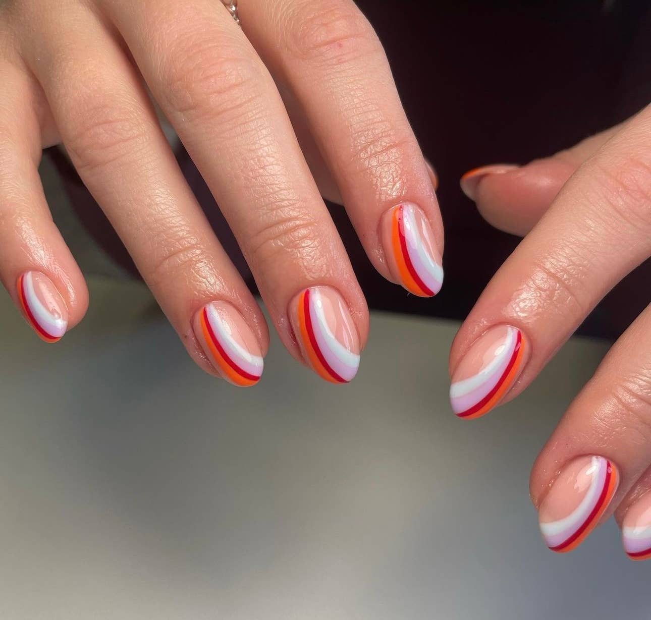 Short Oval Nude Wavy Line Accent Nails Short Oval Nude Wavy Line Accent Nails — Trendy Short Acrylic Nails