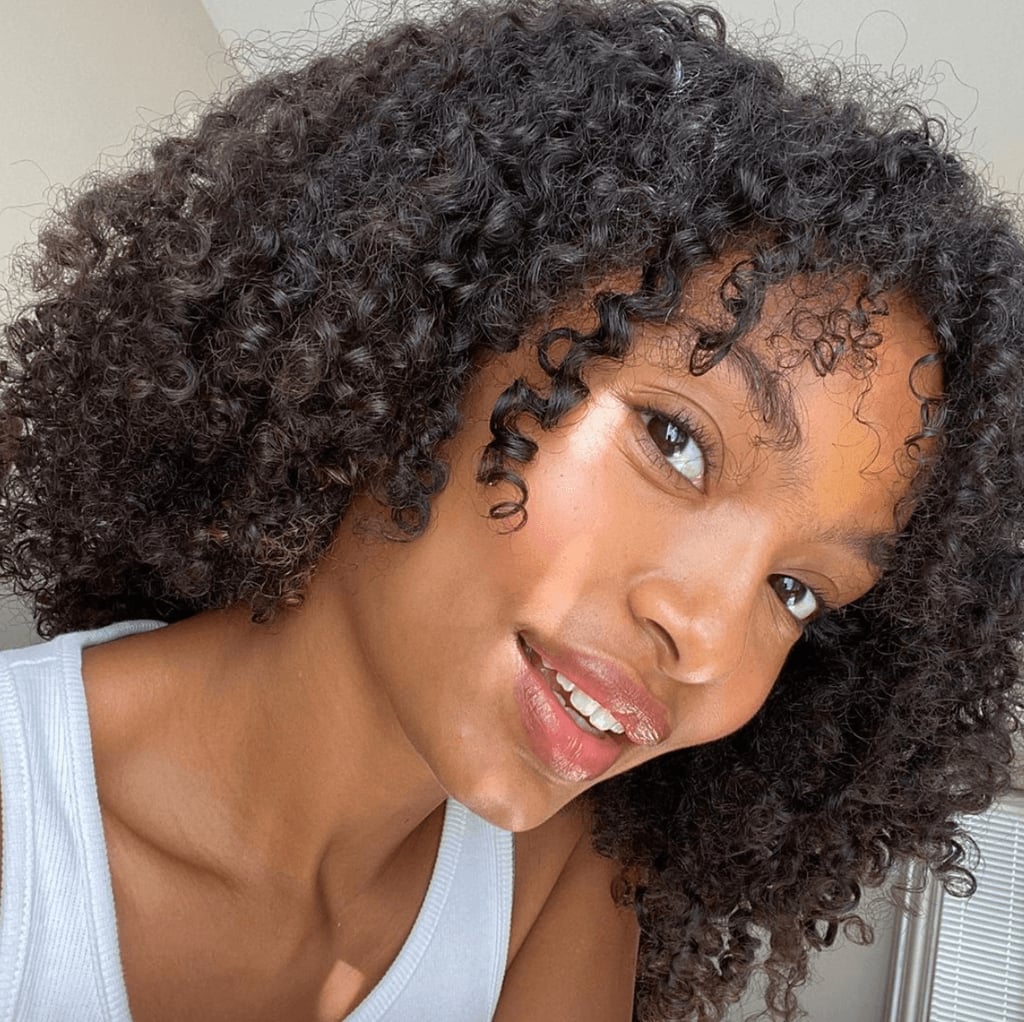 Thick Dark Brown Curly Layers With Curtain Bangs Thick Dark Brown Curly Layers With Curtain Bangs — Trendy Short Natural Hairstyles
