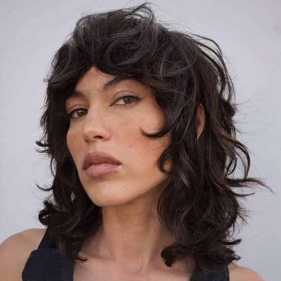 Dark Brown Curls With Lived-In Blonde Balayage — Trendy Shoulder Length Curly Hair
