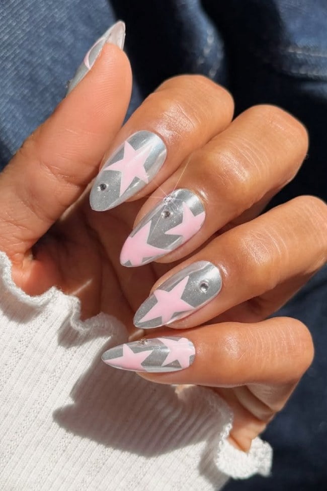 Medium Almond Nails With Pink Stars and Silver Dots Medium Almond Nails With Pink Stars and Silver Dots — Trendy Silver Chrome Nails