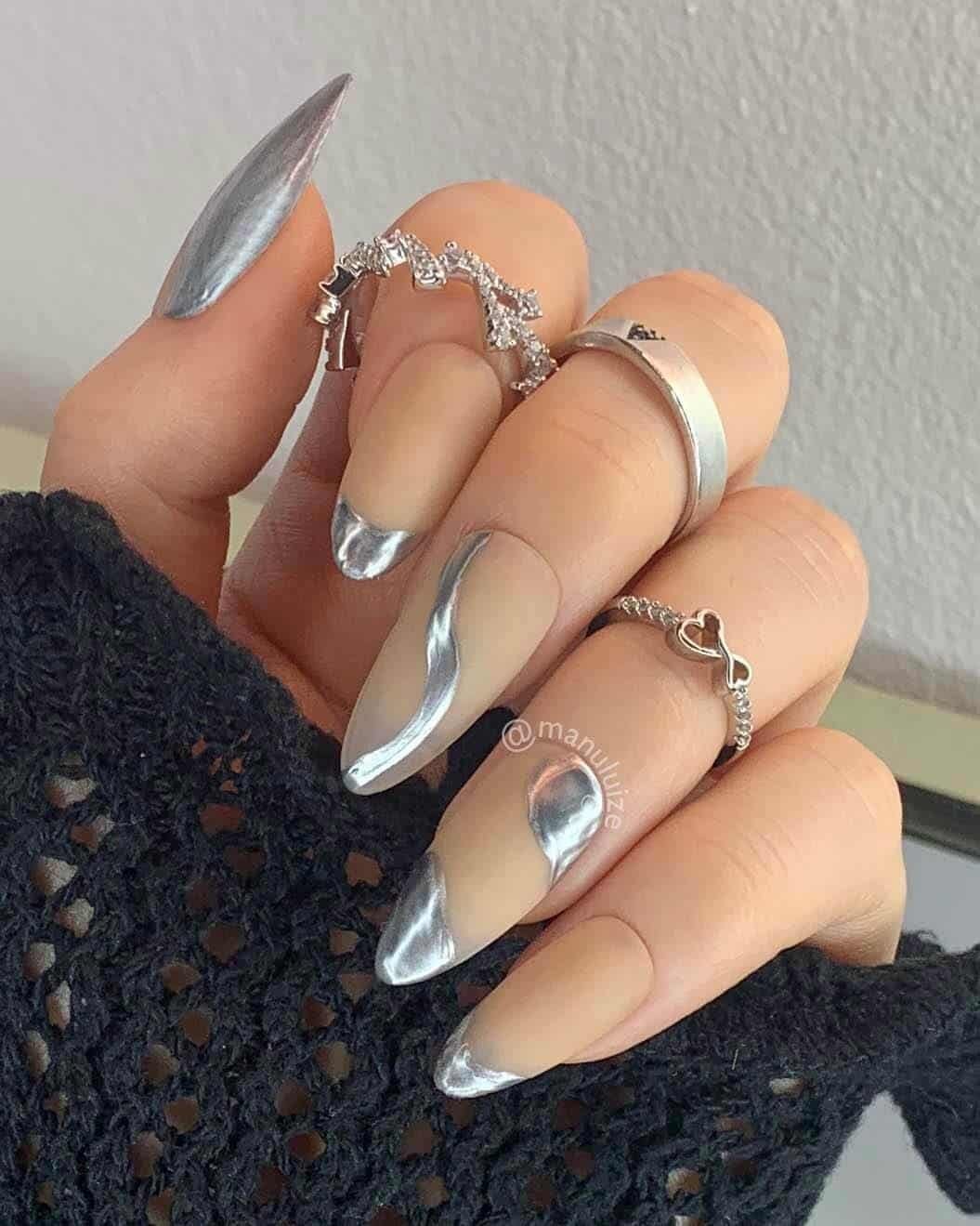 Long Almond Nails With Abstract Silver and French Tips Long Almond Nails With Abstract Silver and French Tips — Trendy Silver Chrome Nails