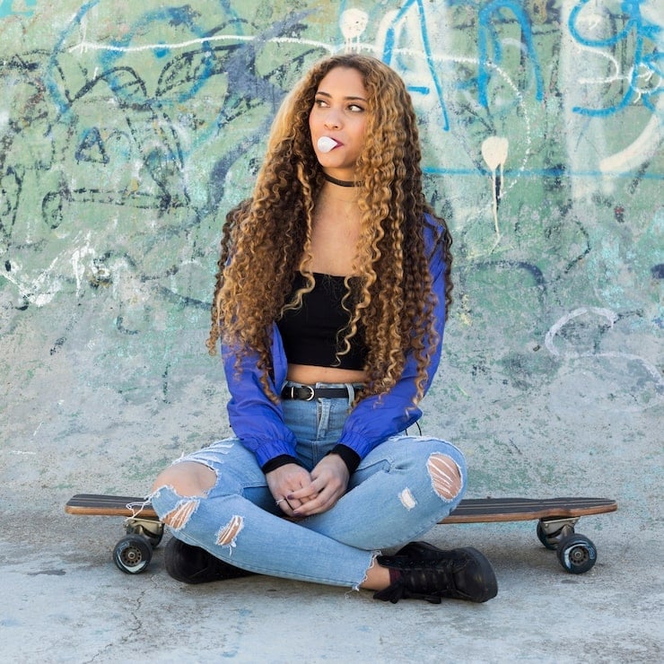 Ripped Jeans with Crop Top and Bomber Jacket Ripped Jeans with Crop Top and Bomber Jacket — Trendy Skater Outfits