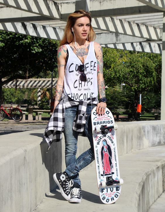 Graphic Tank Top with Distressed Jeans and Plaid Shirt Graphic Tank Top with Distressed Jeans and Plaid Shirt — Trendy Skater Outfits