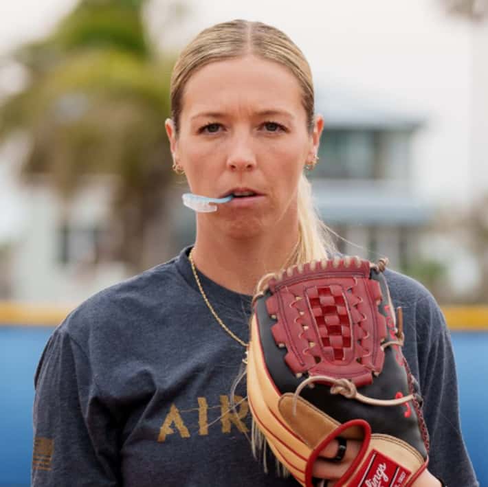 Mid-Back Loose Waves With Side-Swept Bangs — Trendy Softball Hair
