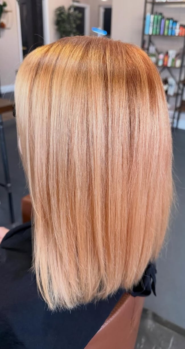 Chin Length Lob With Subtle Highlights — Trendy Strawberry Blonde