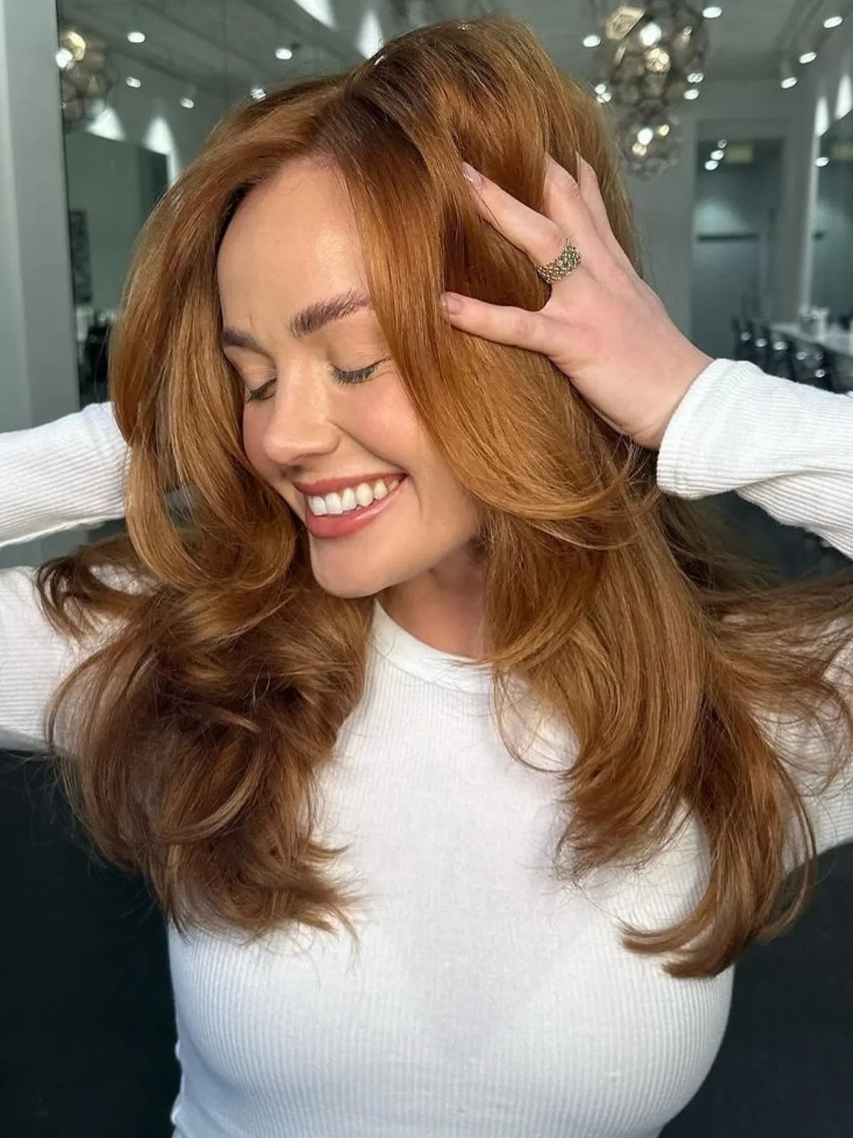 Copper Blonde Mid-Back Voluminous Blowout — Trendy Strawberry Blonde Hair