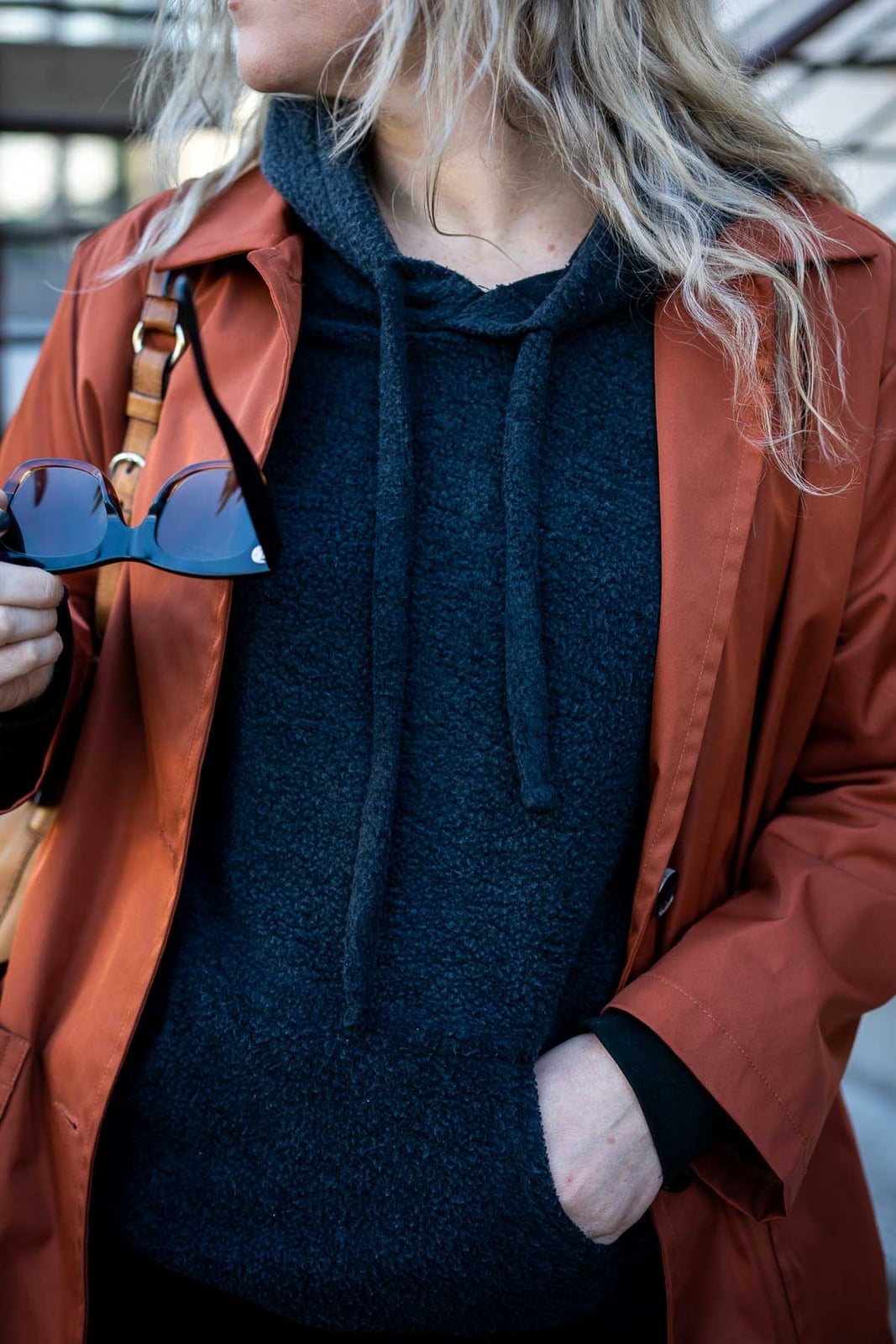 Dark Gray Hoodie Under Rust Orange Jacket, Close-Up Take — Trendy Sweatshirt Outfits Women